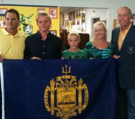 Bryson Mays and family display a Naval Academy flag; from left, father Brent, Bryson, brother Matthew, mother Jodie and grandfather Hans Lawaetz. Bryson Mays and family display a Naval Academy flag; from left, father Brent, Bryson, brother Matthew, mother Jodie and grandfather Hans Lawaetz.